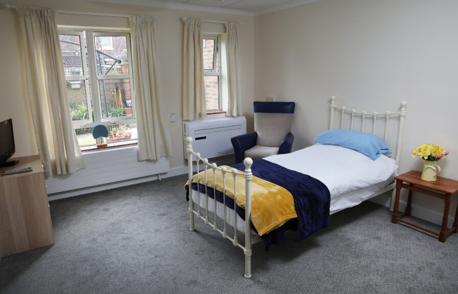 A large bed/sitting room at Russell Churcher Court care home.